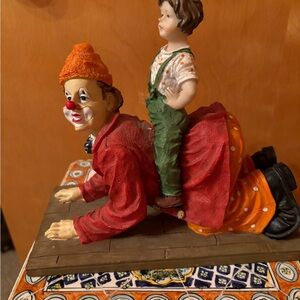 Playful Clown and Child Figurine in Red and Orange